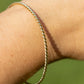 14K Twist Oval Bangle